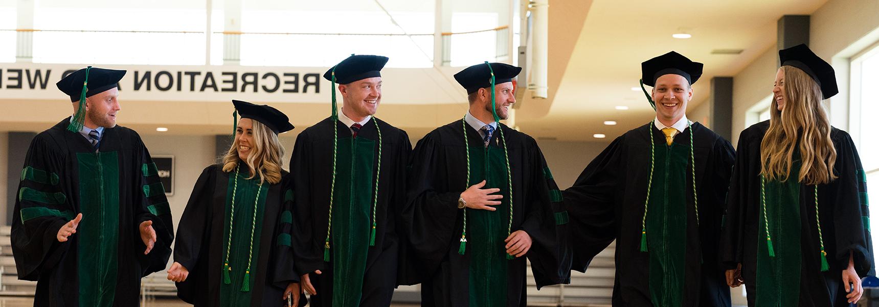 An image of students celebrating graduation