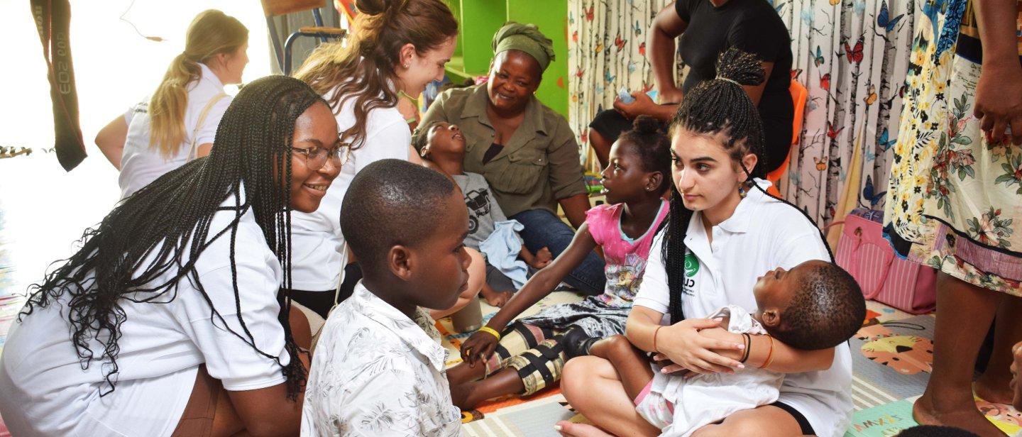Students and children in a health care clinic.